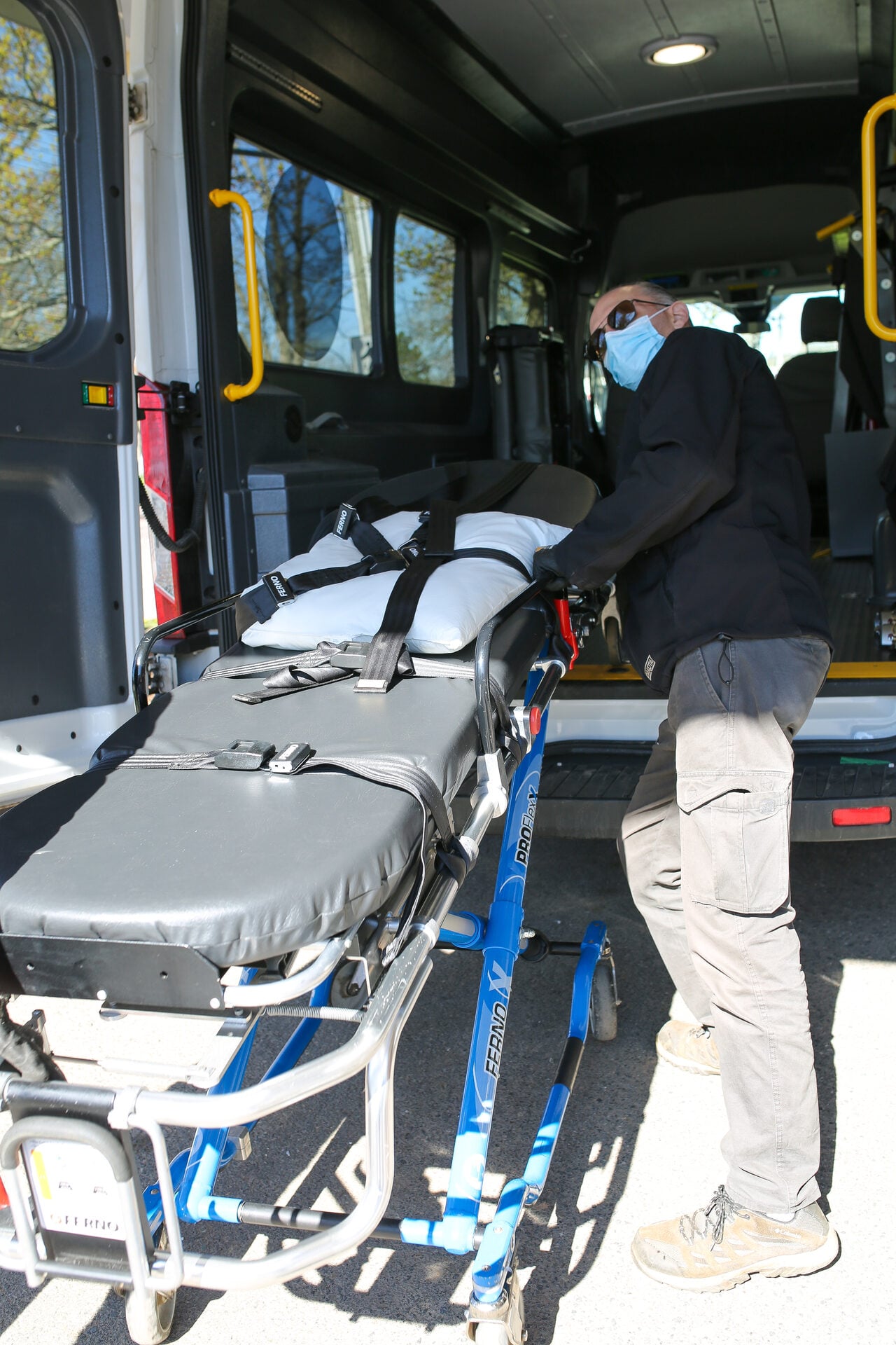 Pat & The Elephant driver with accessible van, professional uniform, welcoming expression